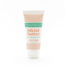 Luxe Shaving Cream Bikini Cutter scented with Mixologie Tempted (Coconut Kiss) Fragrance in a 2 fl oz or 60 mL white tube with orange circle pattern and white cap. Bikini Butter pictured with white background.
